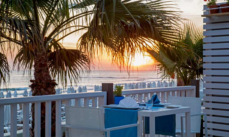 Sunset dining overlooking the sea