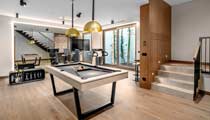 A games room with pool tables and other leisure activities provided for guests