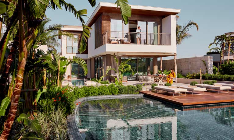 An outdoor swimming pool at one of the villas