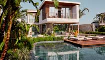 An outdoor swimming pool at one of the villas