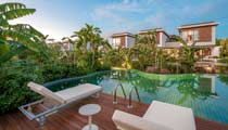 A private terrace outside a villa with a private plunge pool for guests to cool off