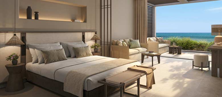 A large five star hotel suite opens up on to an outdoor terrace with uninterrupted sea views at Ikos Kissamos Hotel.