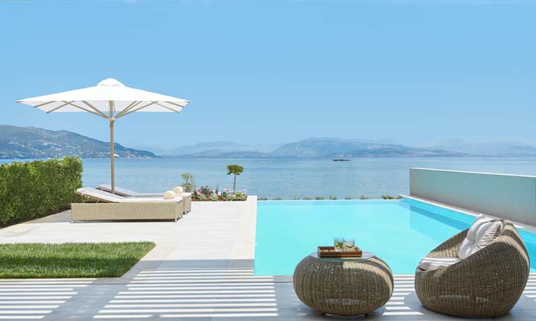A private pool with stunning sea views at an Ikos Deluxe Collection Suite.
