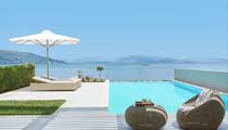 A private pool with stunning sea views at an Ikos Deluxe Collection Suite.