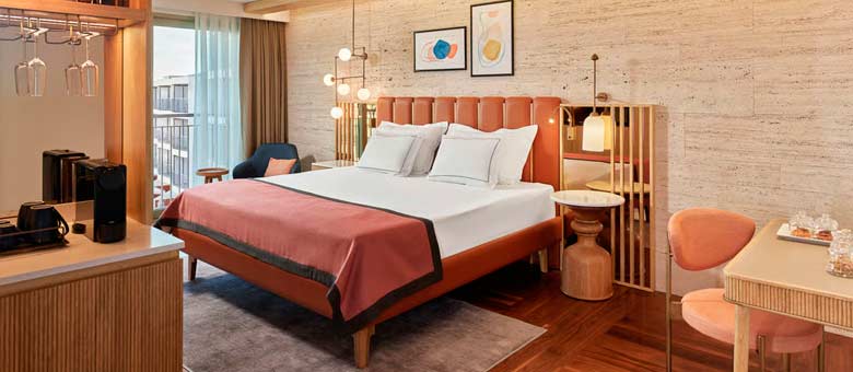 An example of a typical room at Lara Barut Collection, the accommodation is light and spacious featuring modern decor and a range of facilities.